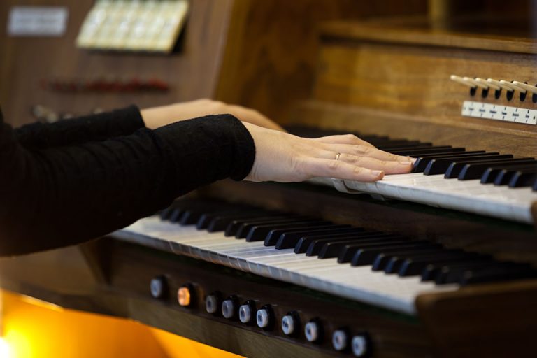 Woman playing the organ